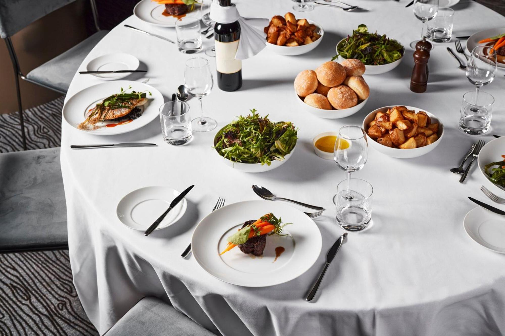 Melbourne Marriott Hotel Docklands Exterior foto A table set for a formal dinner